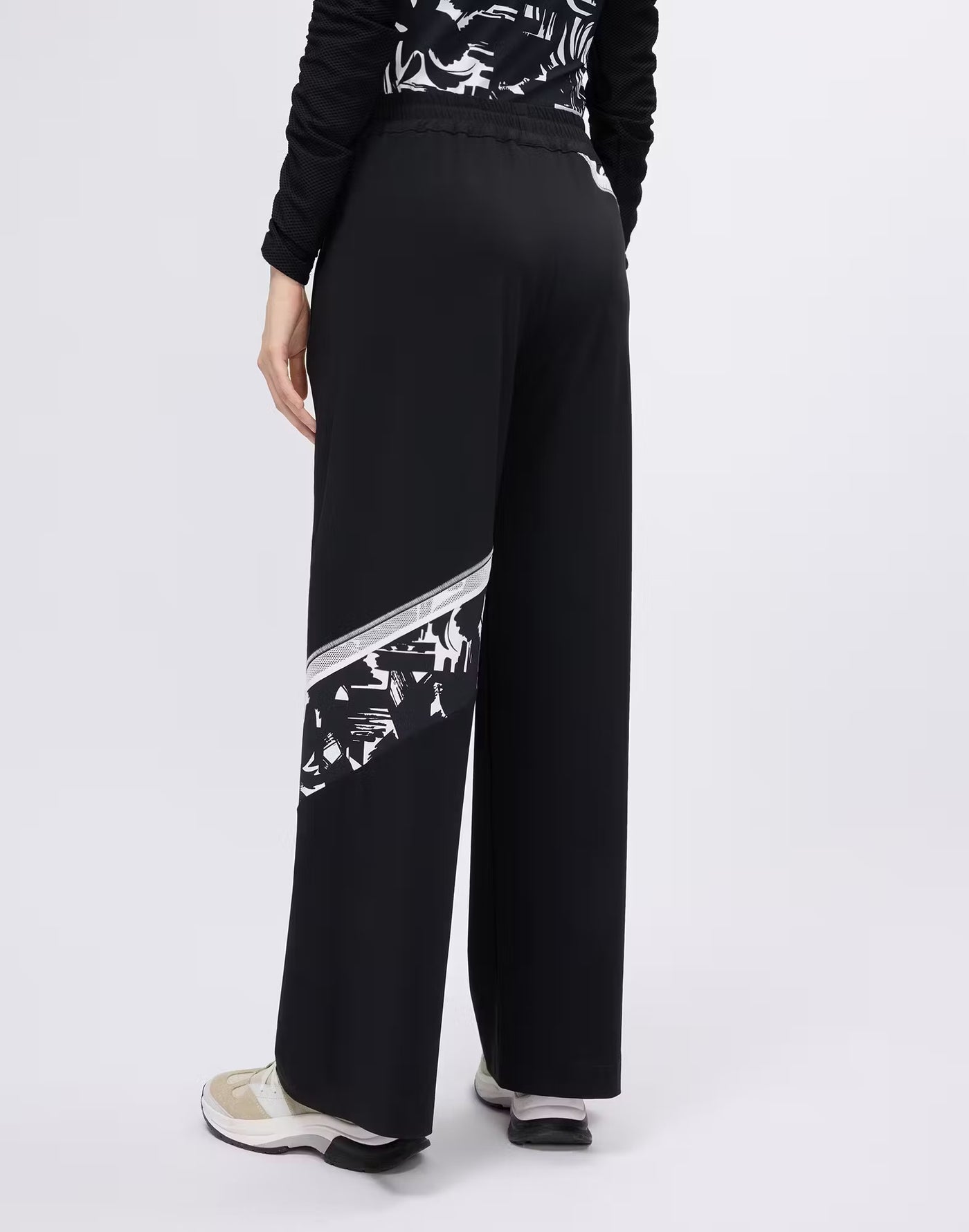 Wide-leg trousers with printed and mesh inserts
