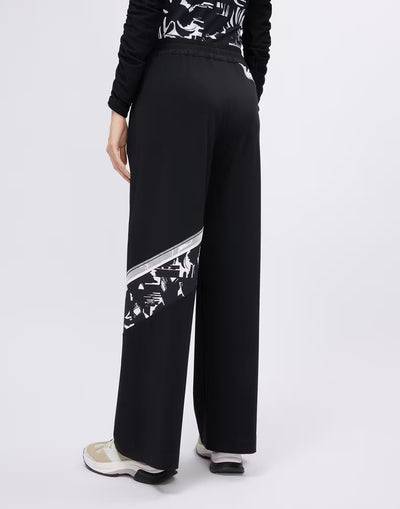 Wide-leg trousers with printed and mesh inserts