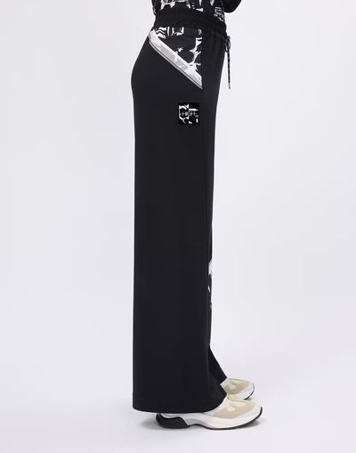 Wide-leg trousers with printed and mesh inserts