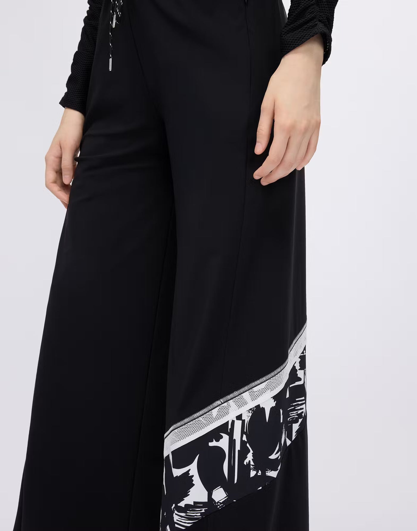 Wide-leg trousers with printed and mesh inserts