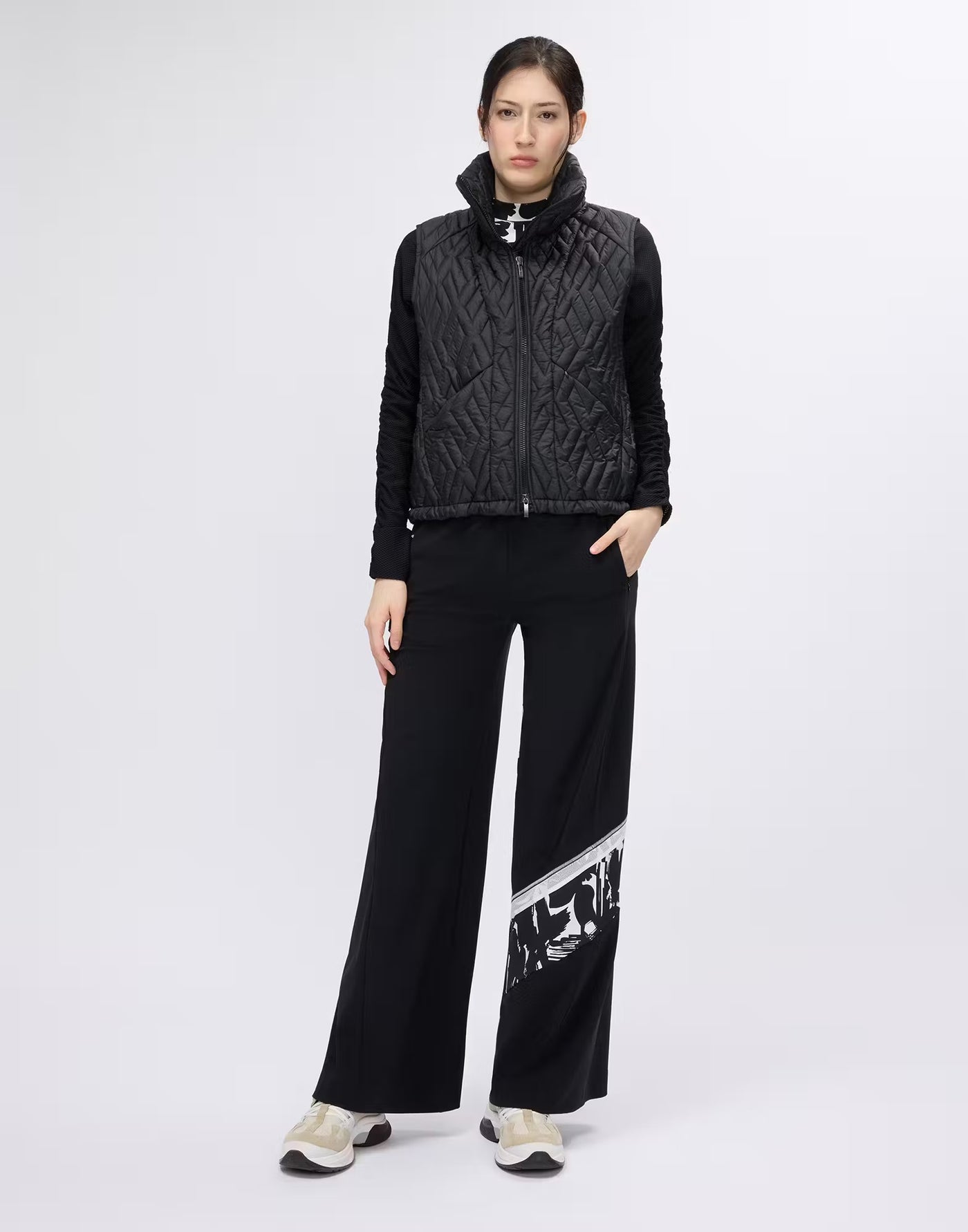 Gilet with geometric quilting