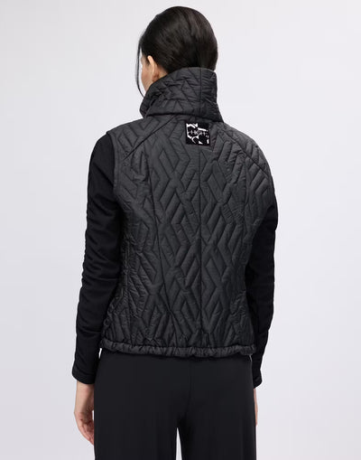 Gilet with geometric quilting