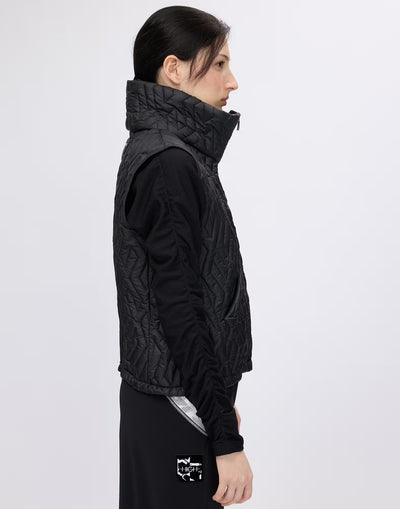 Gilet with geometric quilting