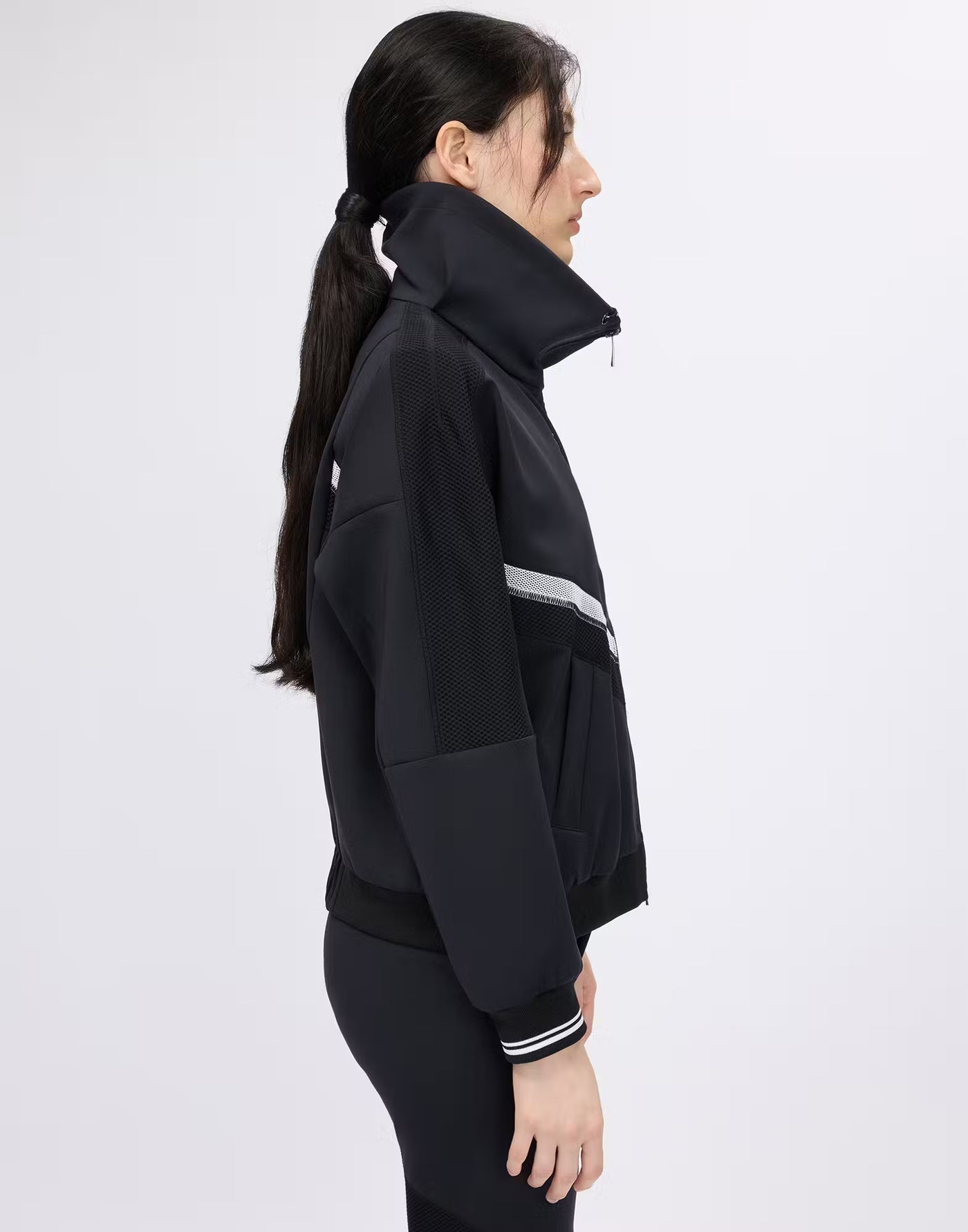 Zip-up sports jacket with mesh inserts