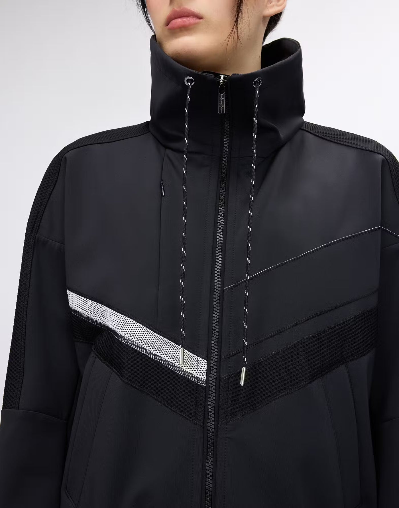 Zip-up sports jacket with mesh inserts
