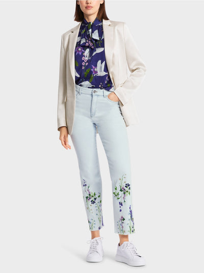 Straight leg jeans with floral print.