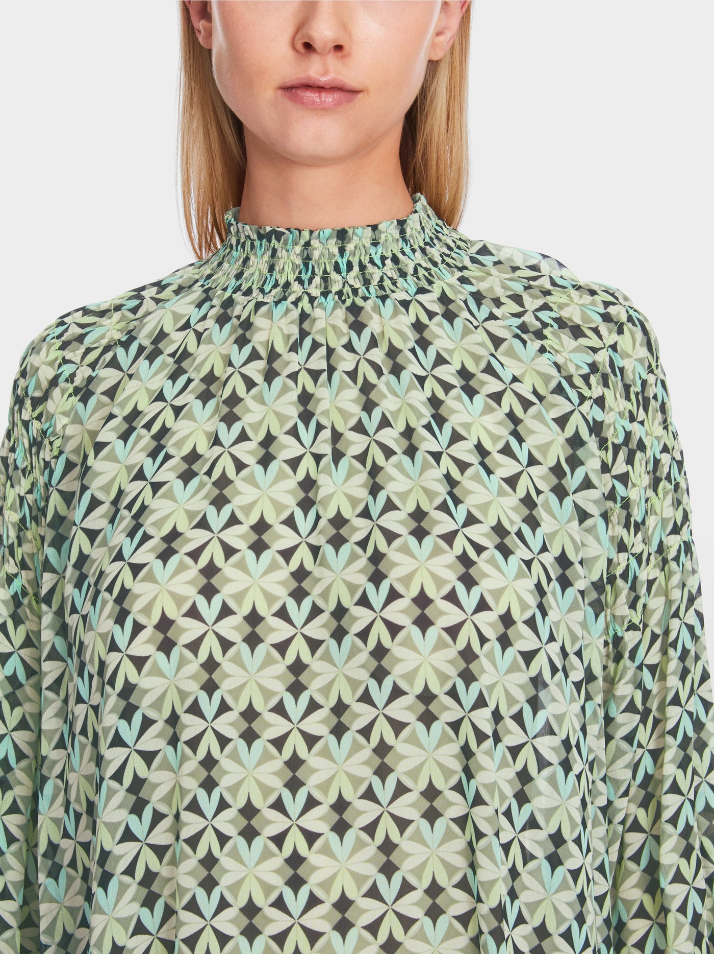 Smocked blouse with graphic pattern