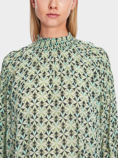 Smocked blouse with graphic pattern