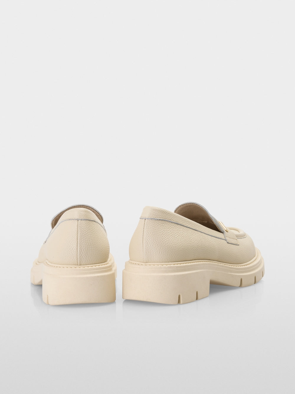 Moccasins with treaded sole