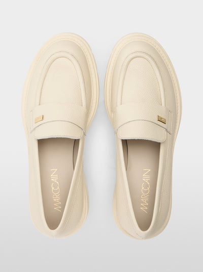 Moccasins with treaded sole