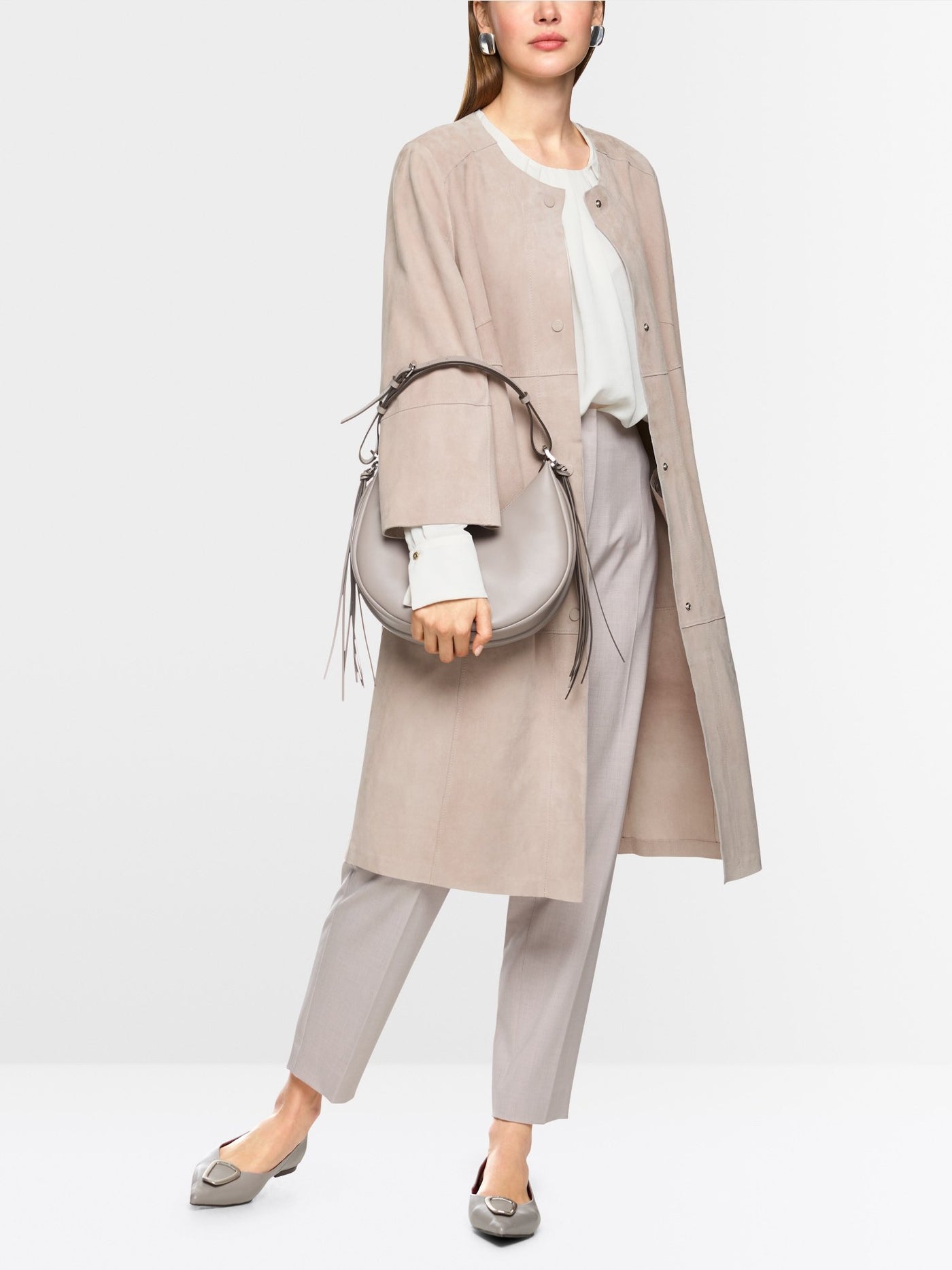 Collarless suede coat