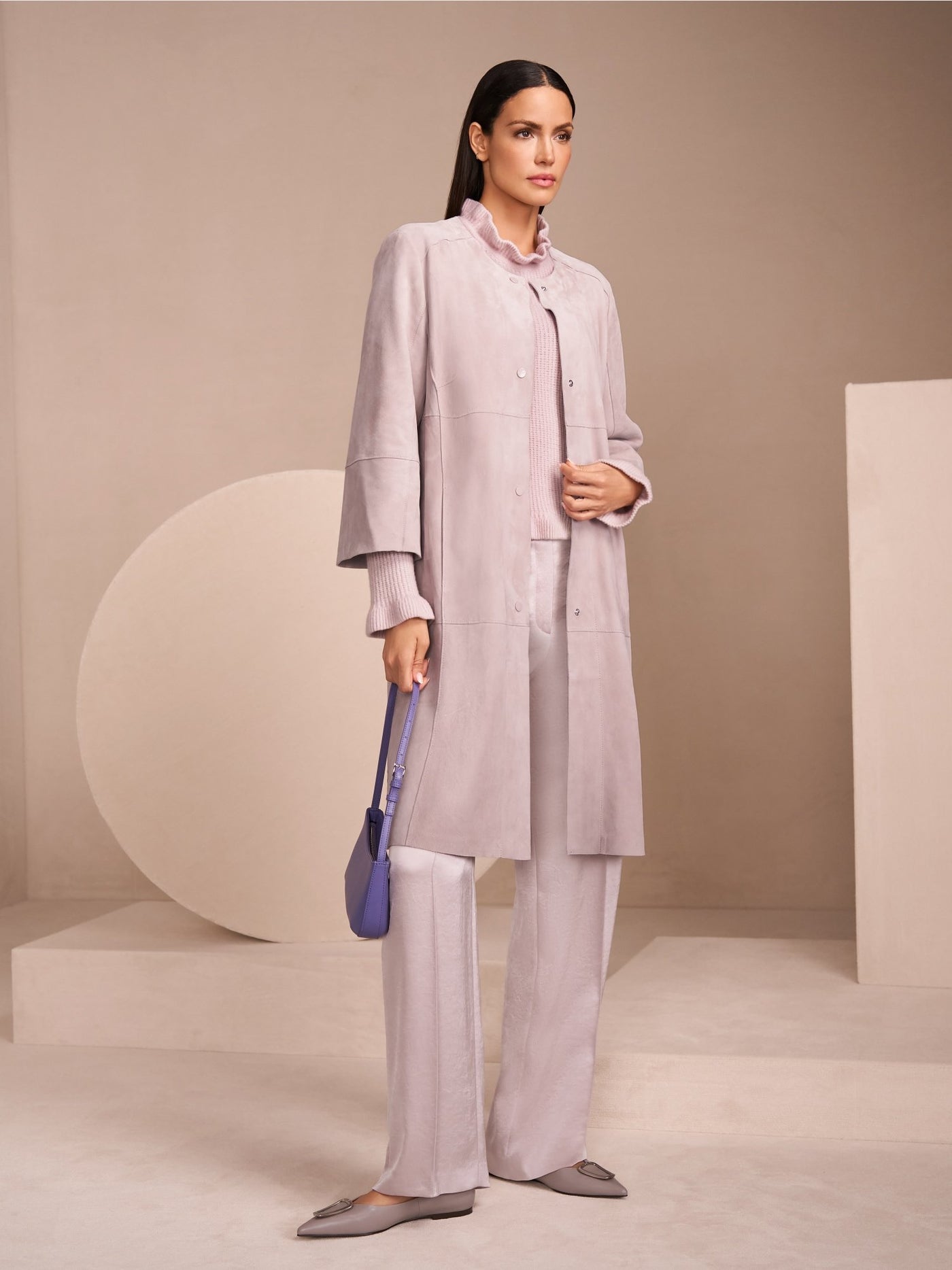 Collarless suede coat