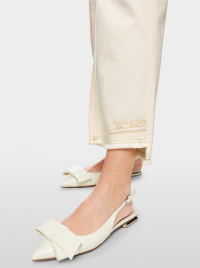 Flared and cropped jeans with embellishments