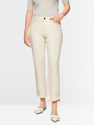 Flared and cropped jeans with embellishments