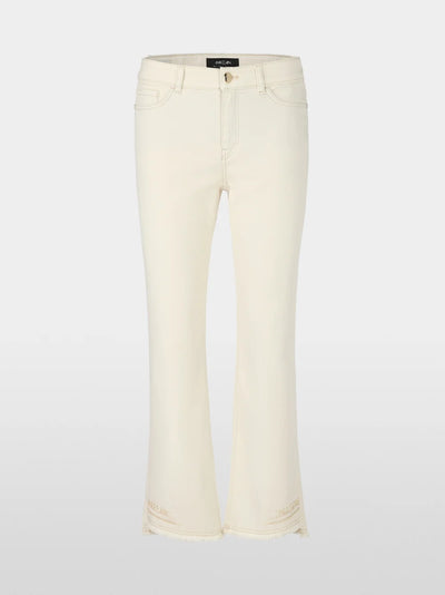 Flared and cropped jeans with embellishments