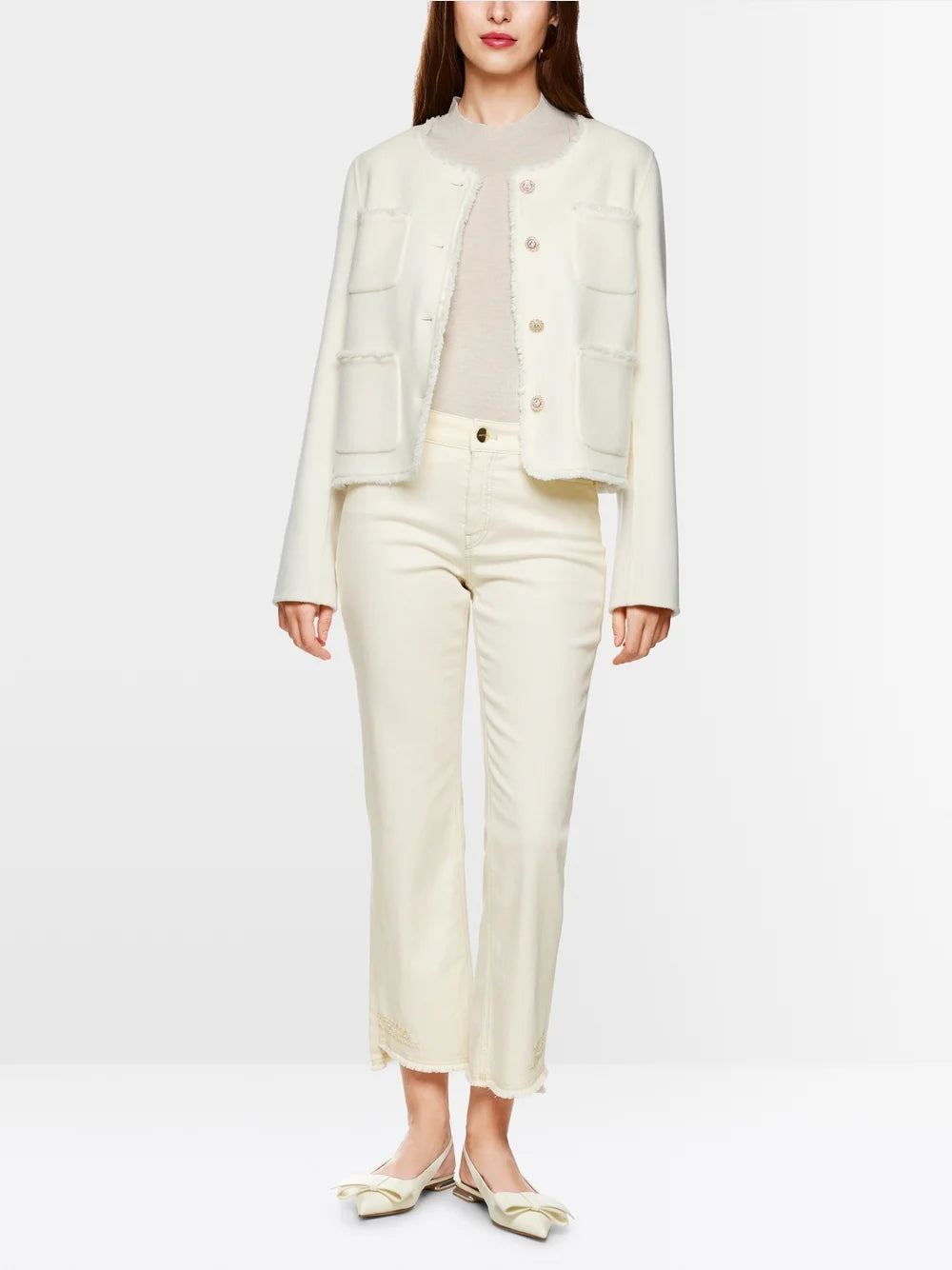 Flared and cropped jeans with embellishments