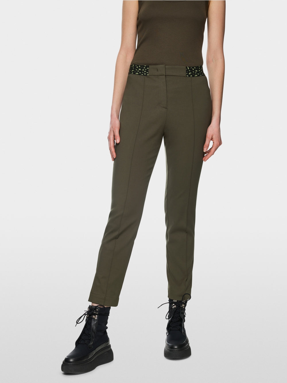 Slim fit  trousers with a stitched crease.